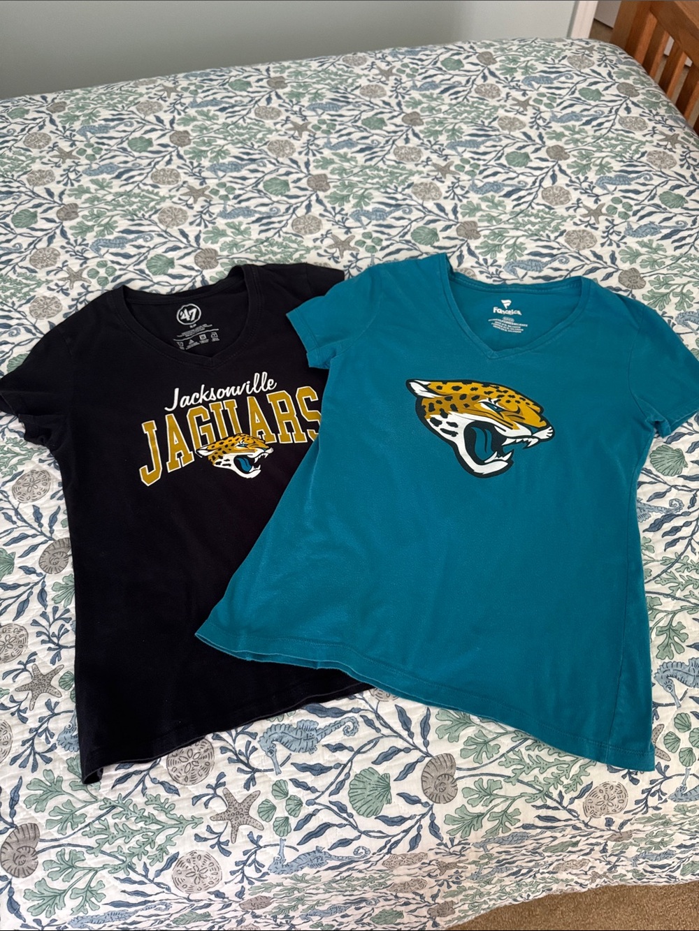 Two Jacksonville Jaguars tee shirts